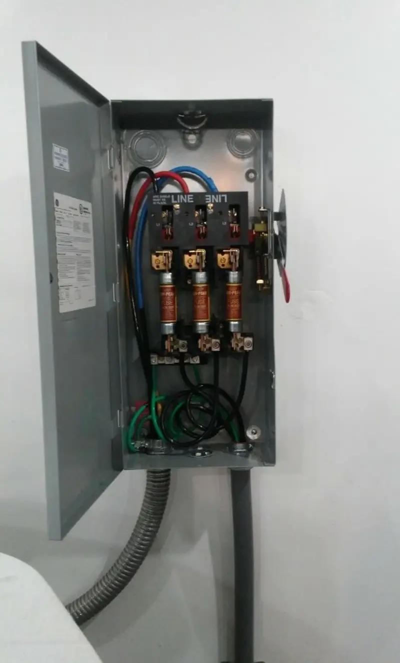 Three-phase disconnect switch installed for Smoke Detector Installation in Parlier